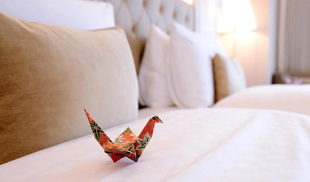 Hotel The Okura Prestige Taipeh Exterior foto A paper crane